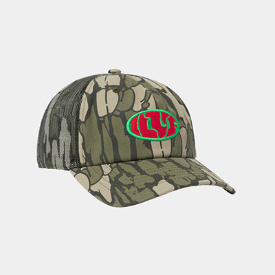 HUF(ハフ)/ WARPED CAMO TRUCKER HAT -CAMO-