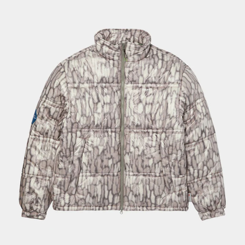 HUF(ハフ)/ 89 WARPED CAMO TYVEK PUFFER -MUTED CAMO-