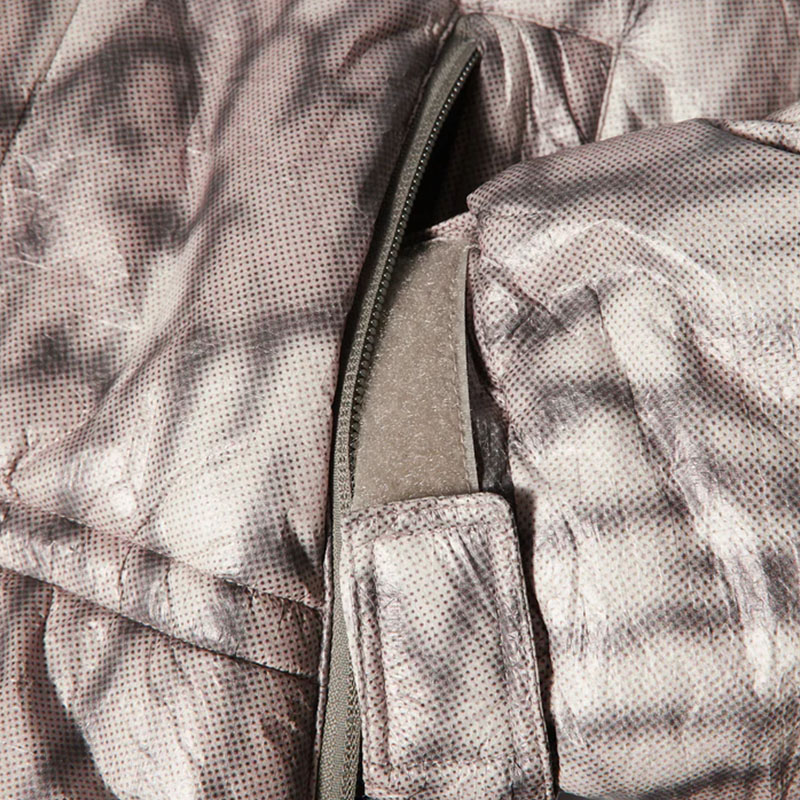 HUF(ハフ)/ 89 WARPED CAMO TYVEK PUFFER -MUTED CAMO-