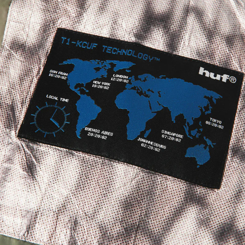 HUF(ハフ)/ 89 WARPED CAMO TYVEK PUFFER -MUTED CAMO-