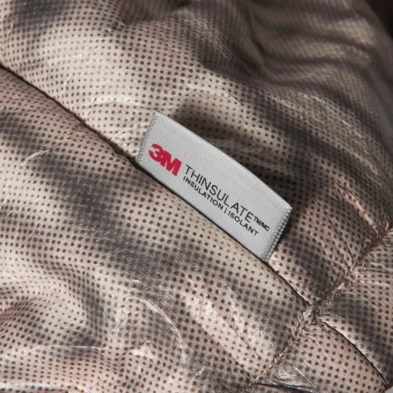 HUF(ハフ)/ 89 WARPED CAMO TYVEK PUFFER -MUTED CAMO-